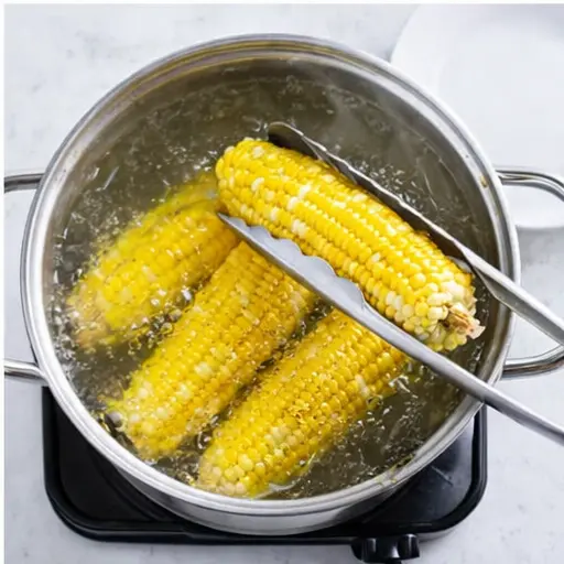 Step 4: Lifting finished corn from pot
