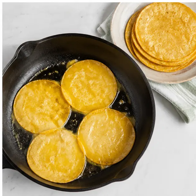 Step 4: Warming corn tortillas in melted butter