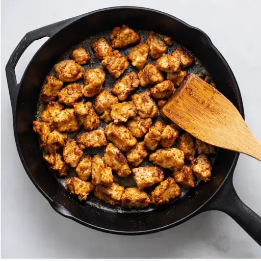 Step 2: Sear chicken in hot cast iron skillet until charred