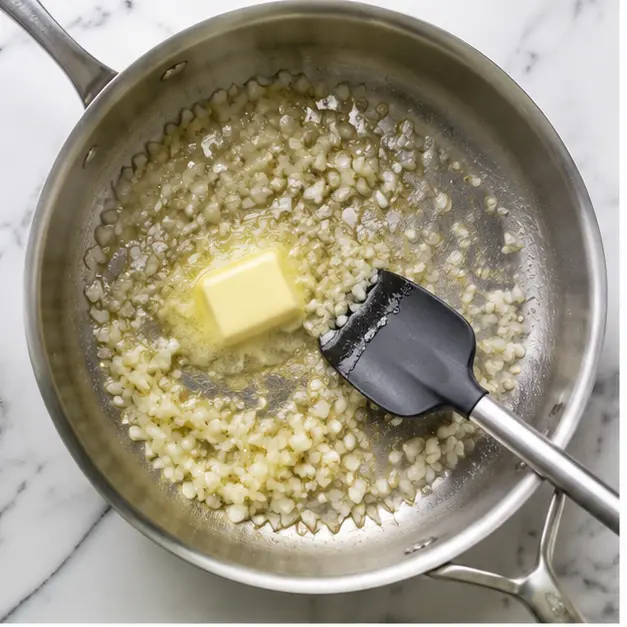 Step 1: Sauté onion in butter until translucent