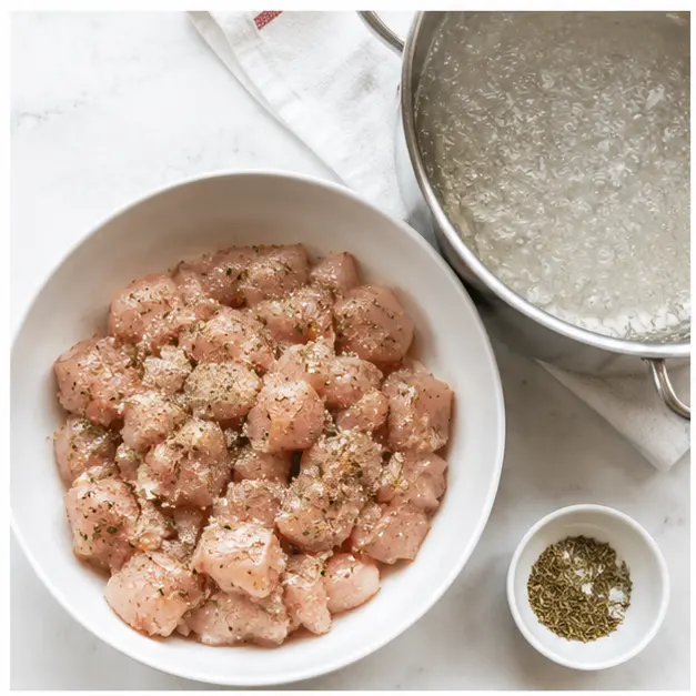 Season chicken and boil pasta