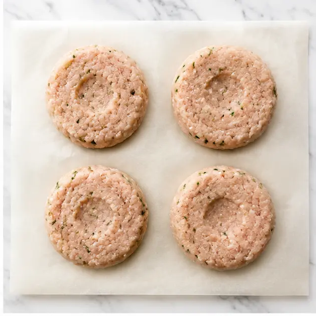 Step 2: Shaped patties with thumb indent on parchment paper