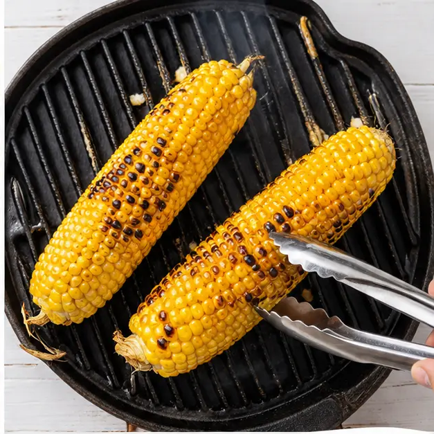 Step 2: Grilling corn until charred