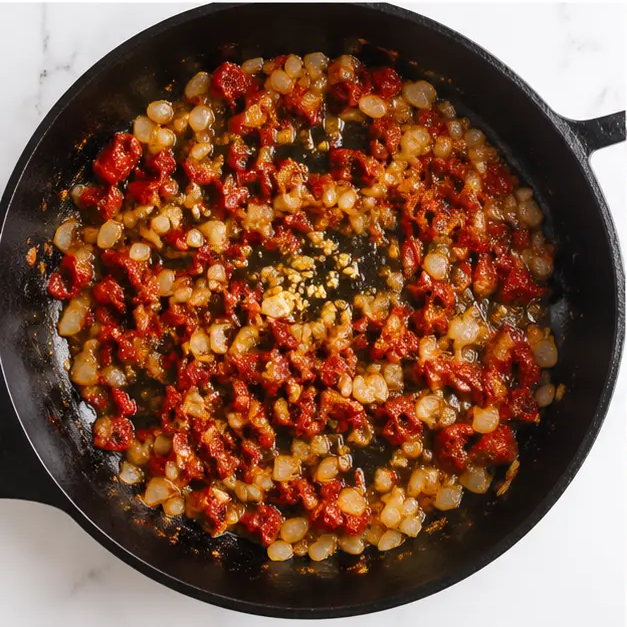 Step 3: Sautéing aromatics with sun-dried tomatoes