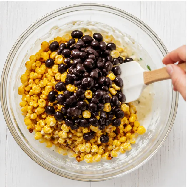 Step 3: Folding in warm corn and black beans