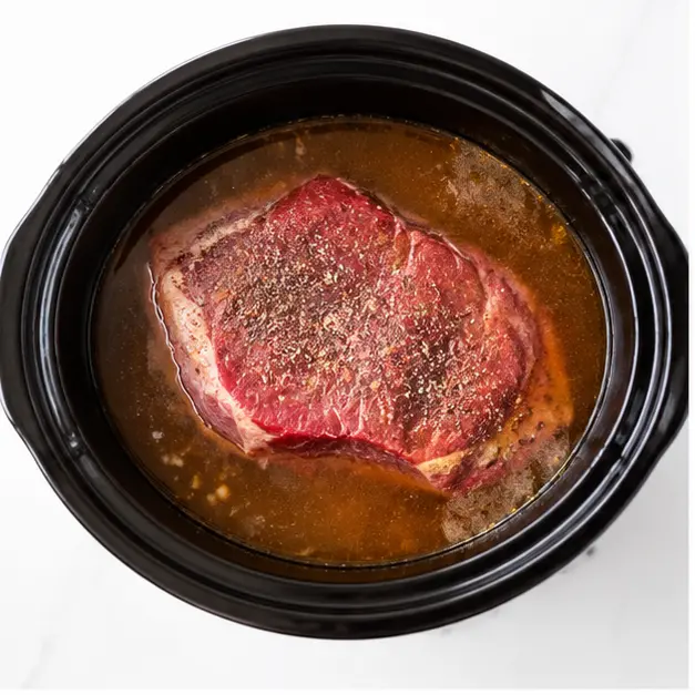 Step 1: Season and slow cook the chuck roast