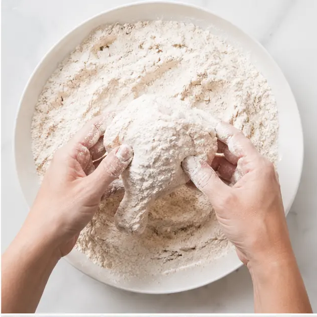 Step 2: Dredge in seasoned flour
