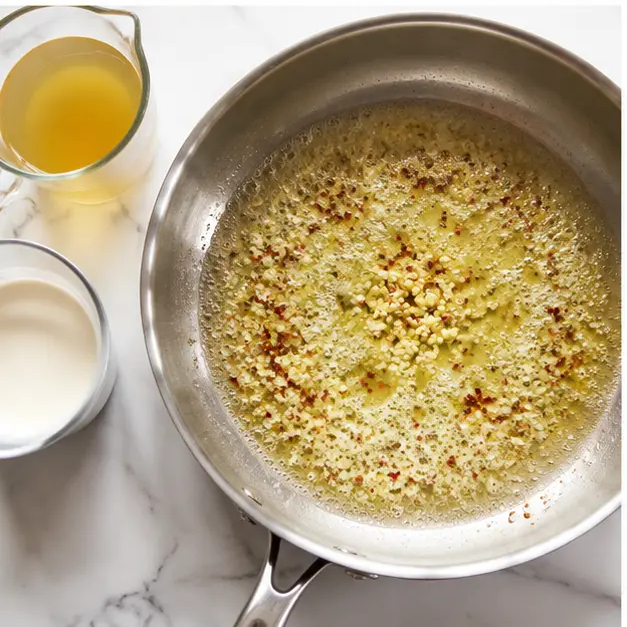 Step 3: Making the creamy garlic butter sauce with red pepper flakes