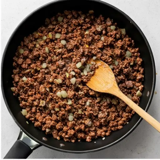 Step 2: Browning ground beef with onion and garlic