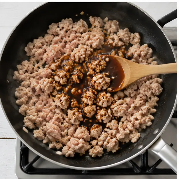 Step 3: Brown ground chicken and add sauce