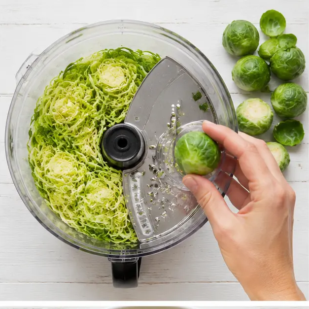 Step 2: Shred the Brussels sprouts into thin uniform ribbons