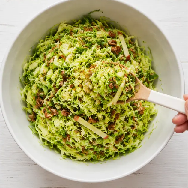 Step 4: Whisk the Meyer lemon dressing and toss the slaw together