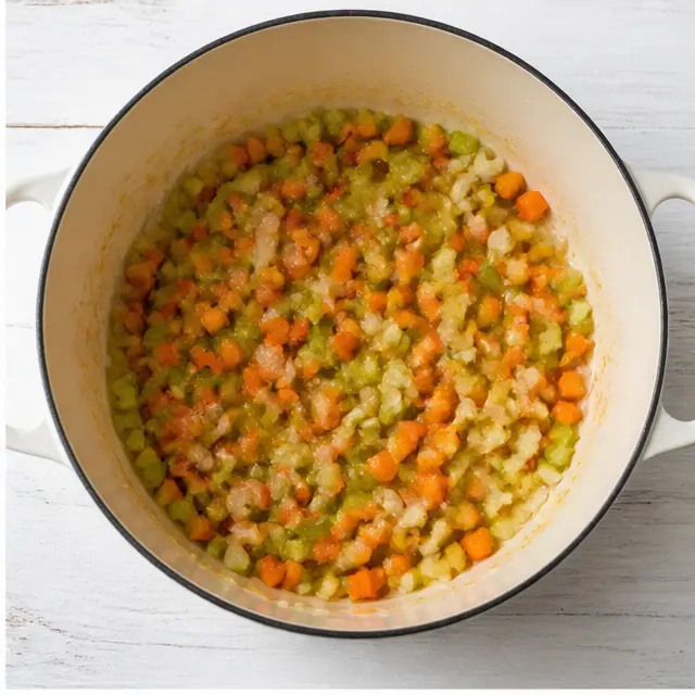Saute the onion, celery, carrots, and garlic until fragrant