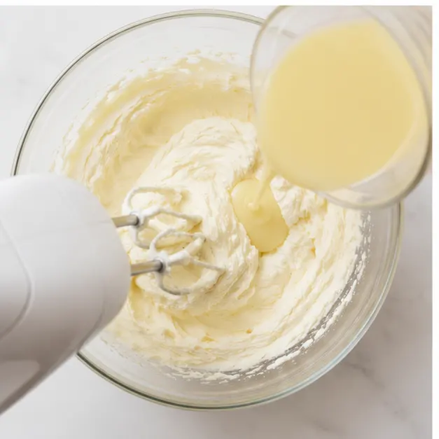 Beat cream cheese until light and fluffy