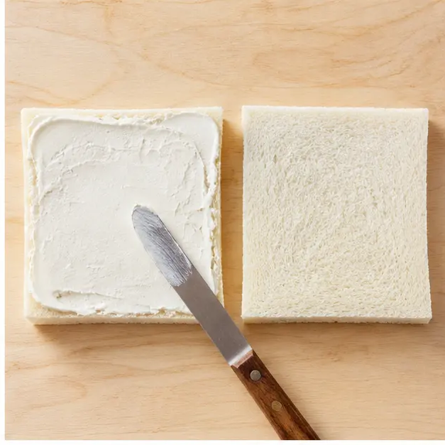 Step 2: Spread softened cream cheese on every bread slice