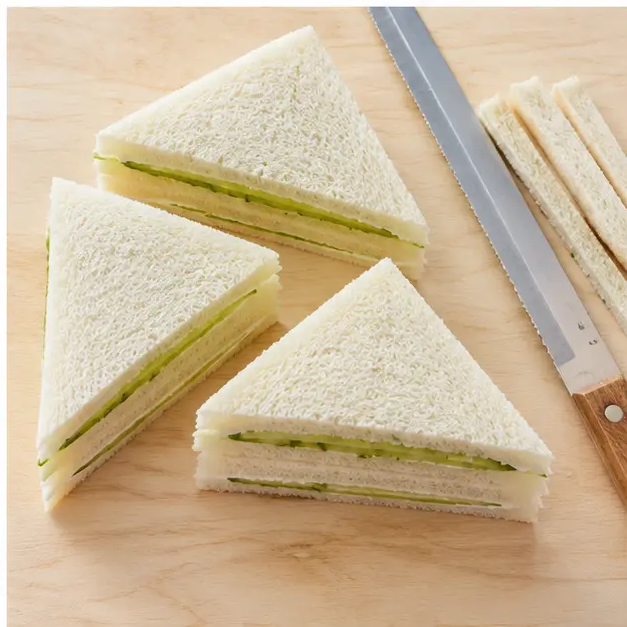Step 4: Press, trim crusts, and slice into neat triangles