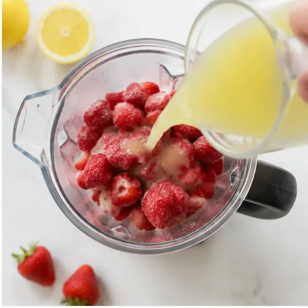 Step 2: Pour 1/2 cup of fresh lemon juice over the berries