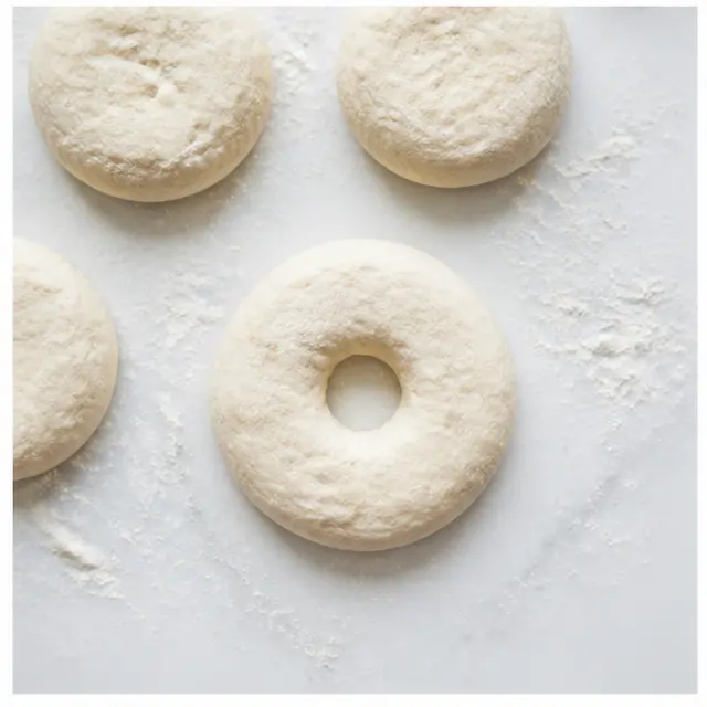 Press discs and form the bagel holes