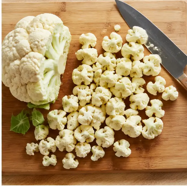 Step 2: Cutting cauliflower into small grape-sized florets