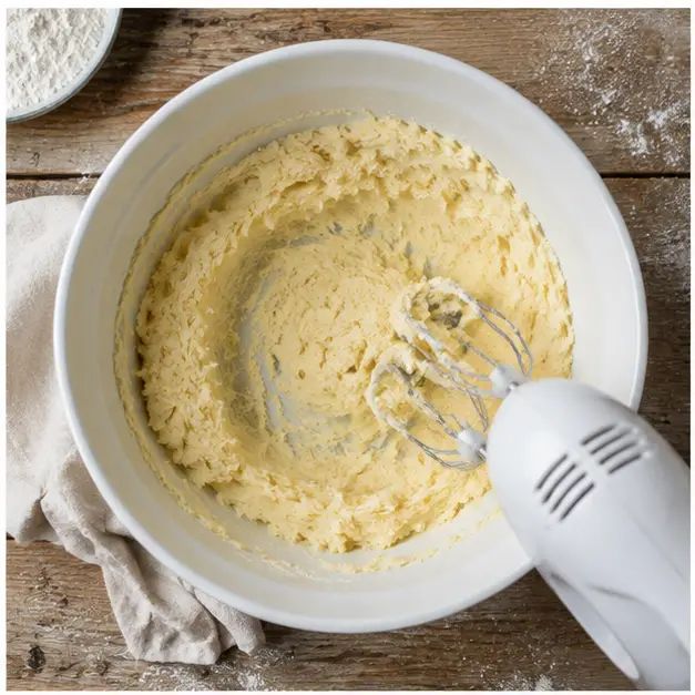Step 1: Creaming unsalted butter and granulated sugar until light and fluffy