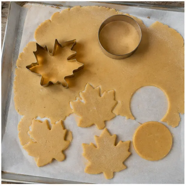 Step 4: Cutting shapes with cookie cutters and baking until lightly golden