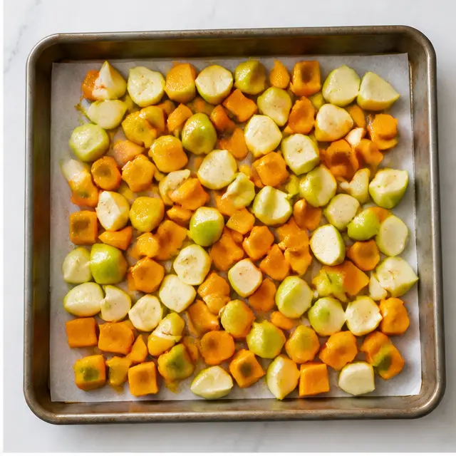 Step 2: Roast cubed squash, apple, and onion on a baking sheet