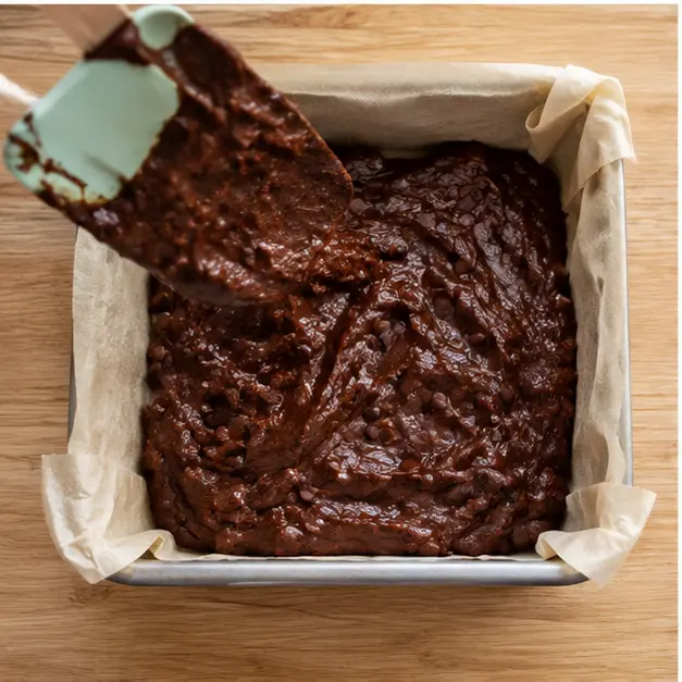 Step 3: Fold in chocolate chips and fill the pan