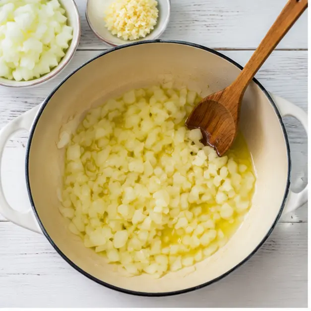 Step 1: Softening diced onion in olive oil until translucent