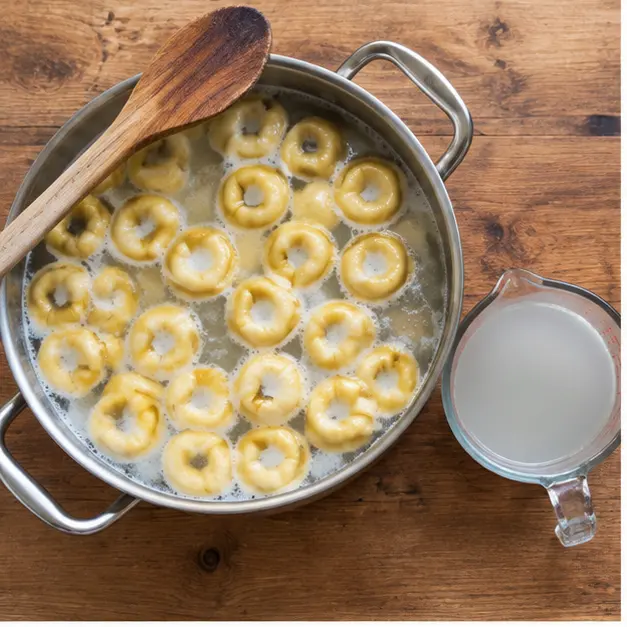 Step 1: Boiling ring-shaped cheese tortellini in generously salted water and scooping out starchy pasta water
